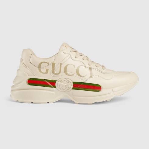 Stylish Gucci sneakers worn in a streetwear outfit